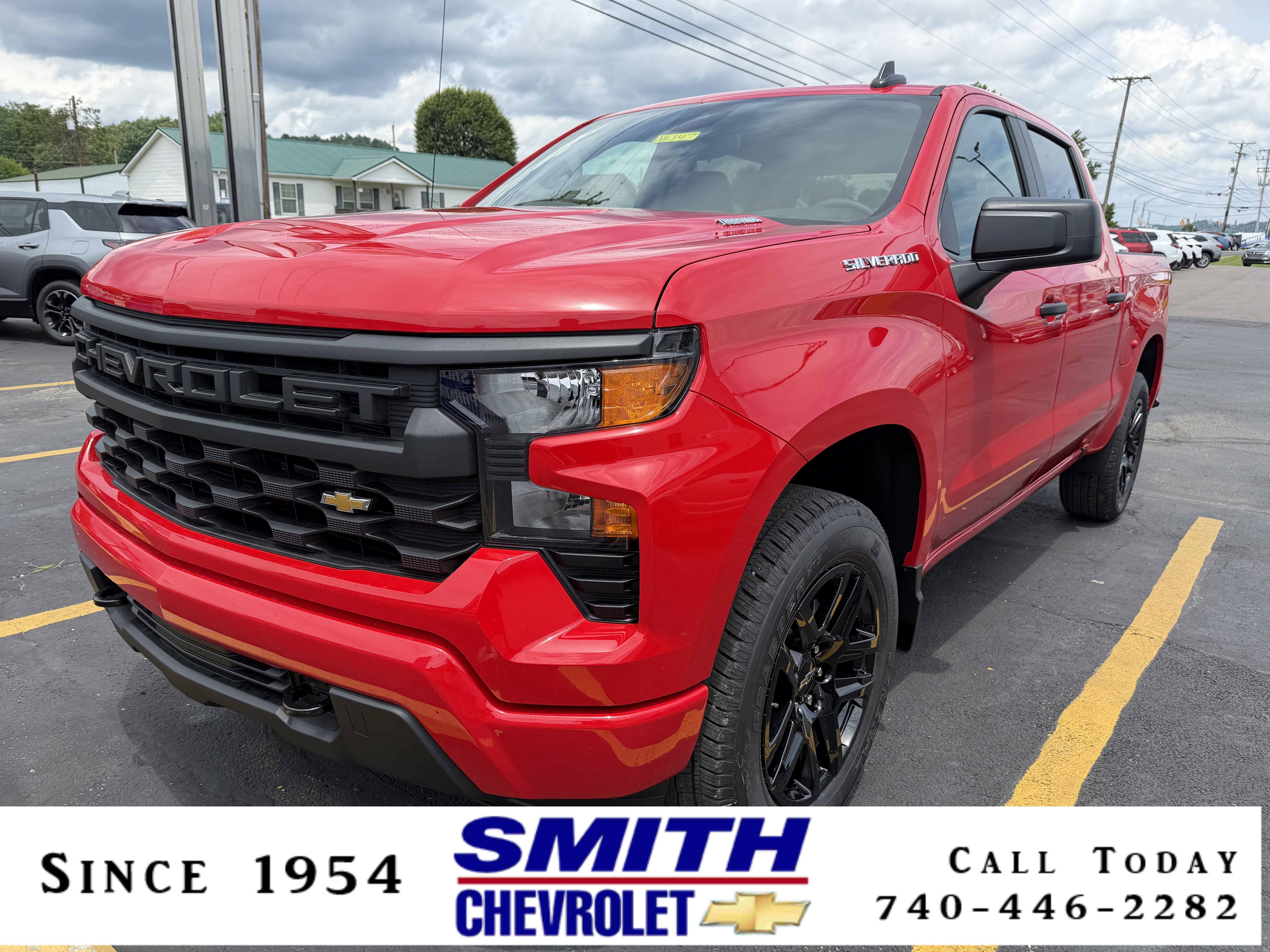 2026 Chevrolet Silverado 1500 Custom in Red Hot — front three-quarter view