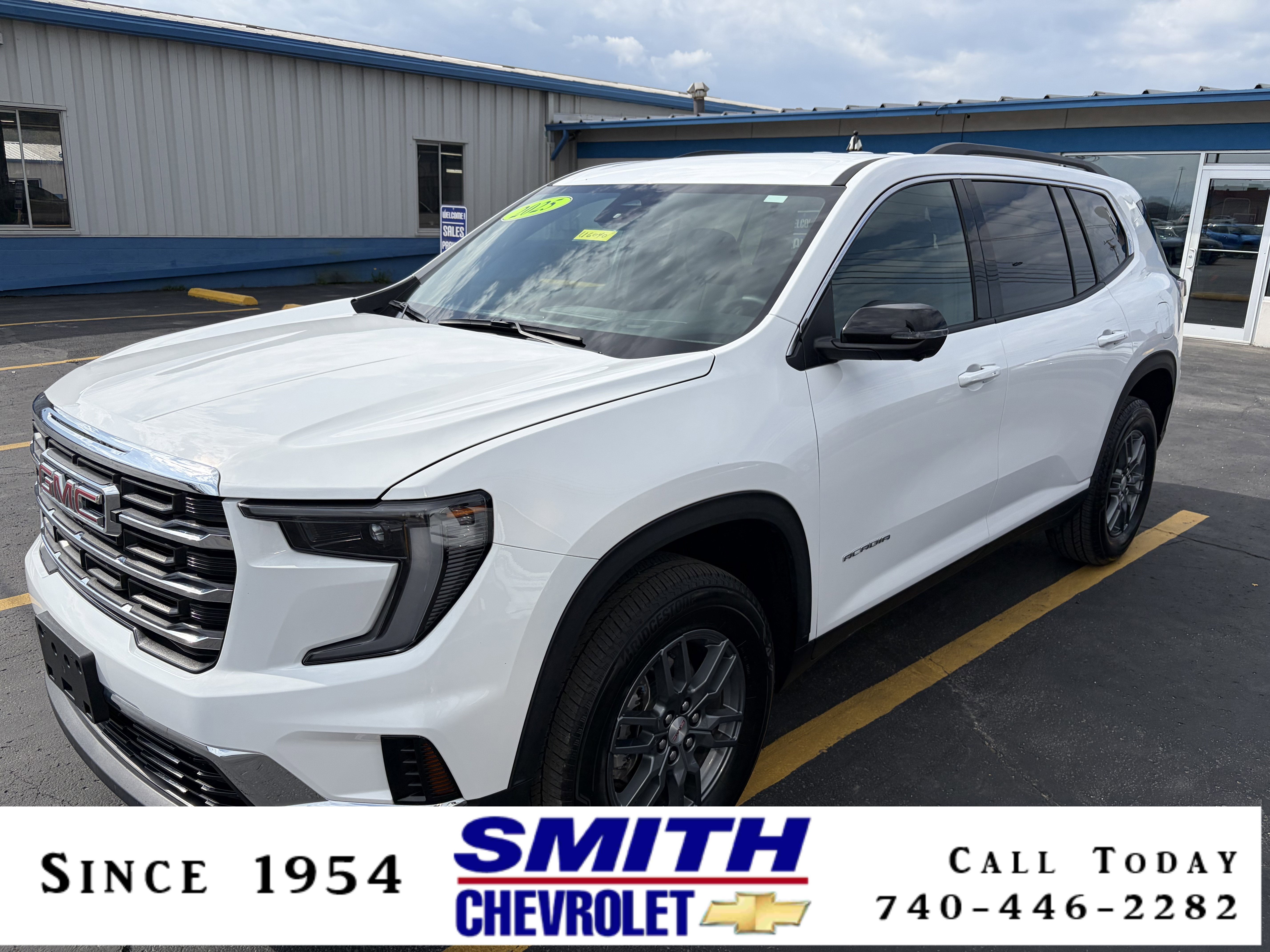 2025 GMC Acadia Elevation in Summit White — front three-quarter view