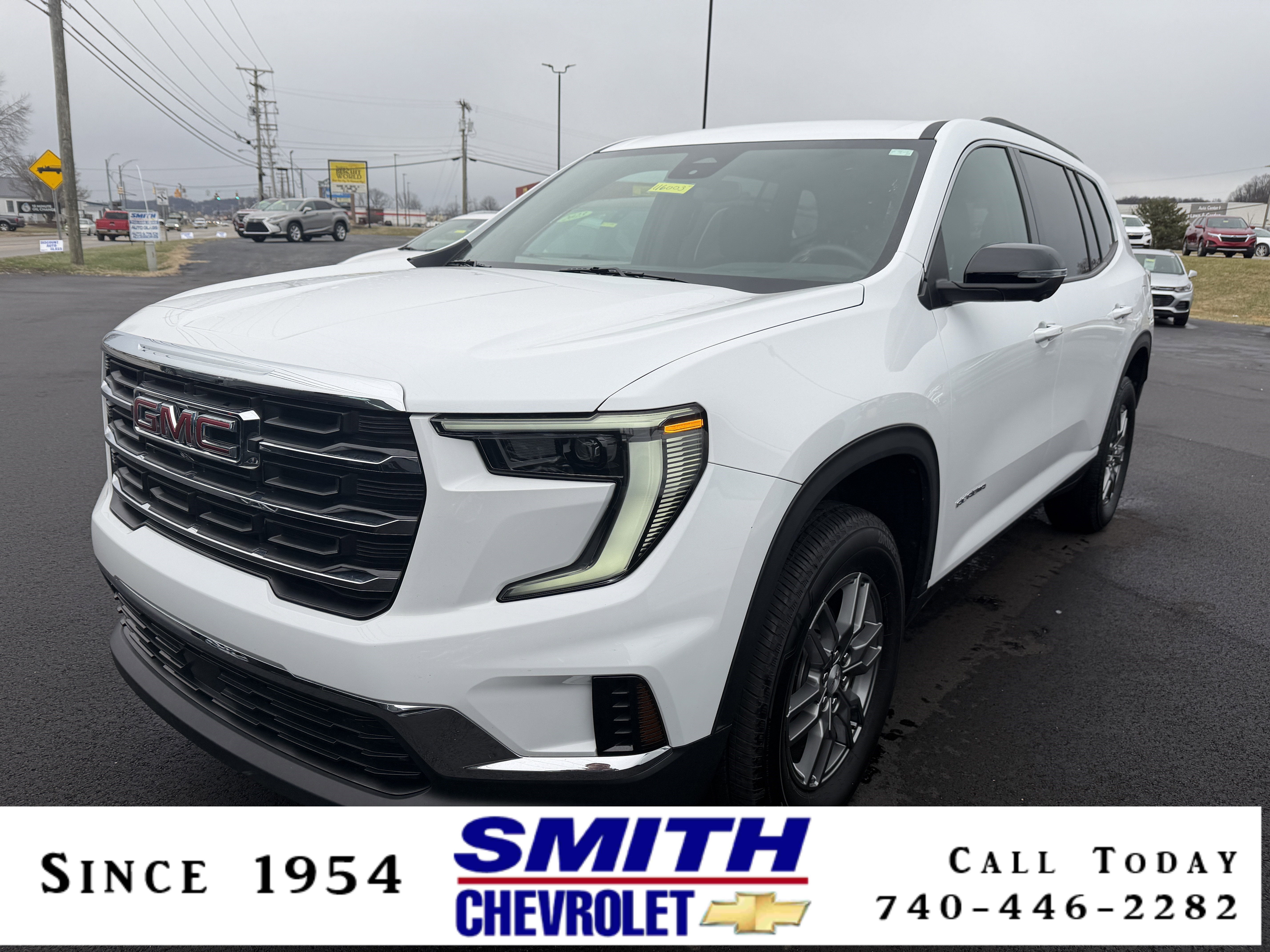 2025 GMC Acadia Elevation in Summit White — front three-quarter view