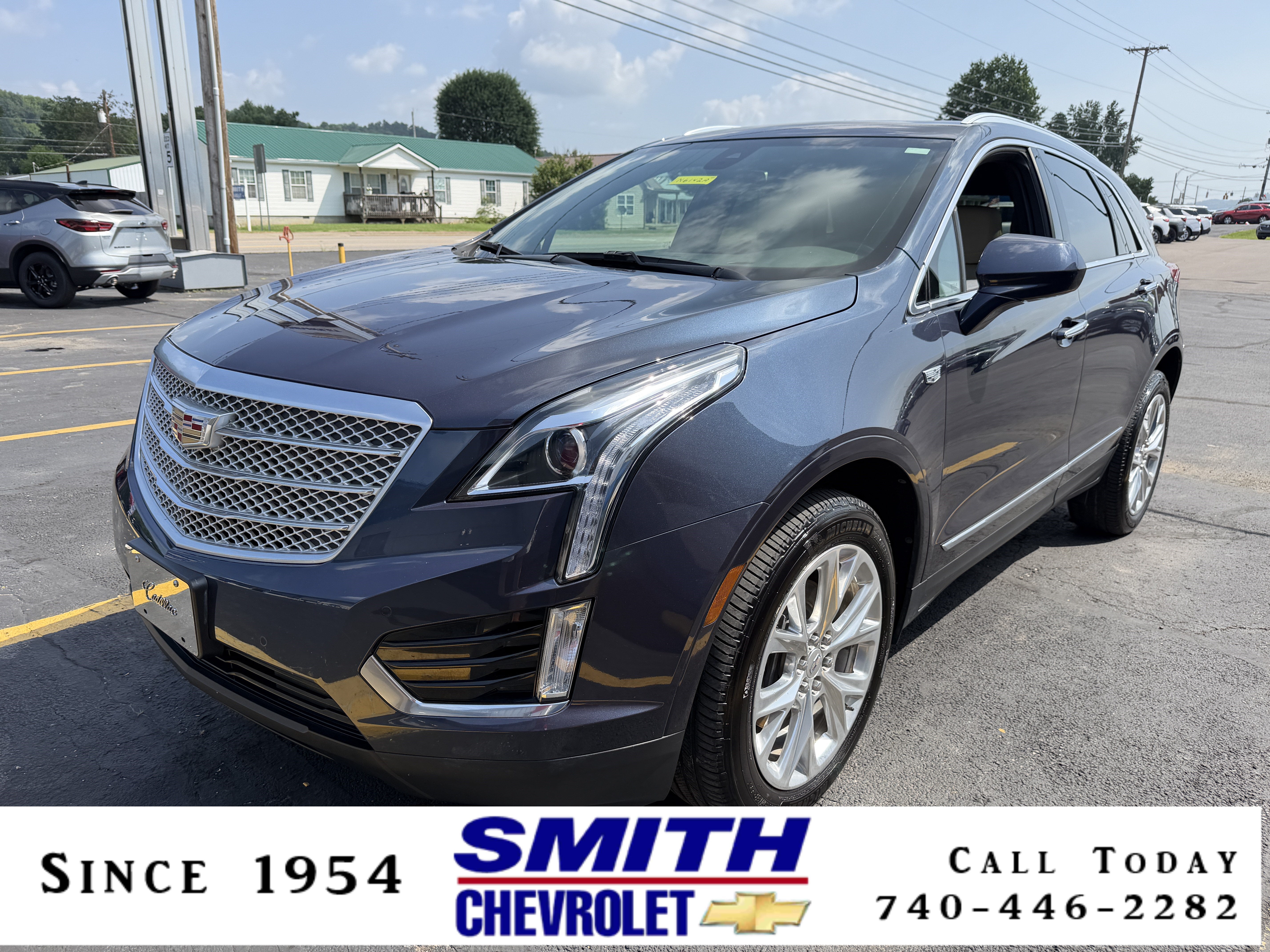 2019 Cadillac XT5 Luxury FWD in Harbor Blue Metallic — front three-quarter view