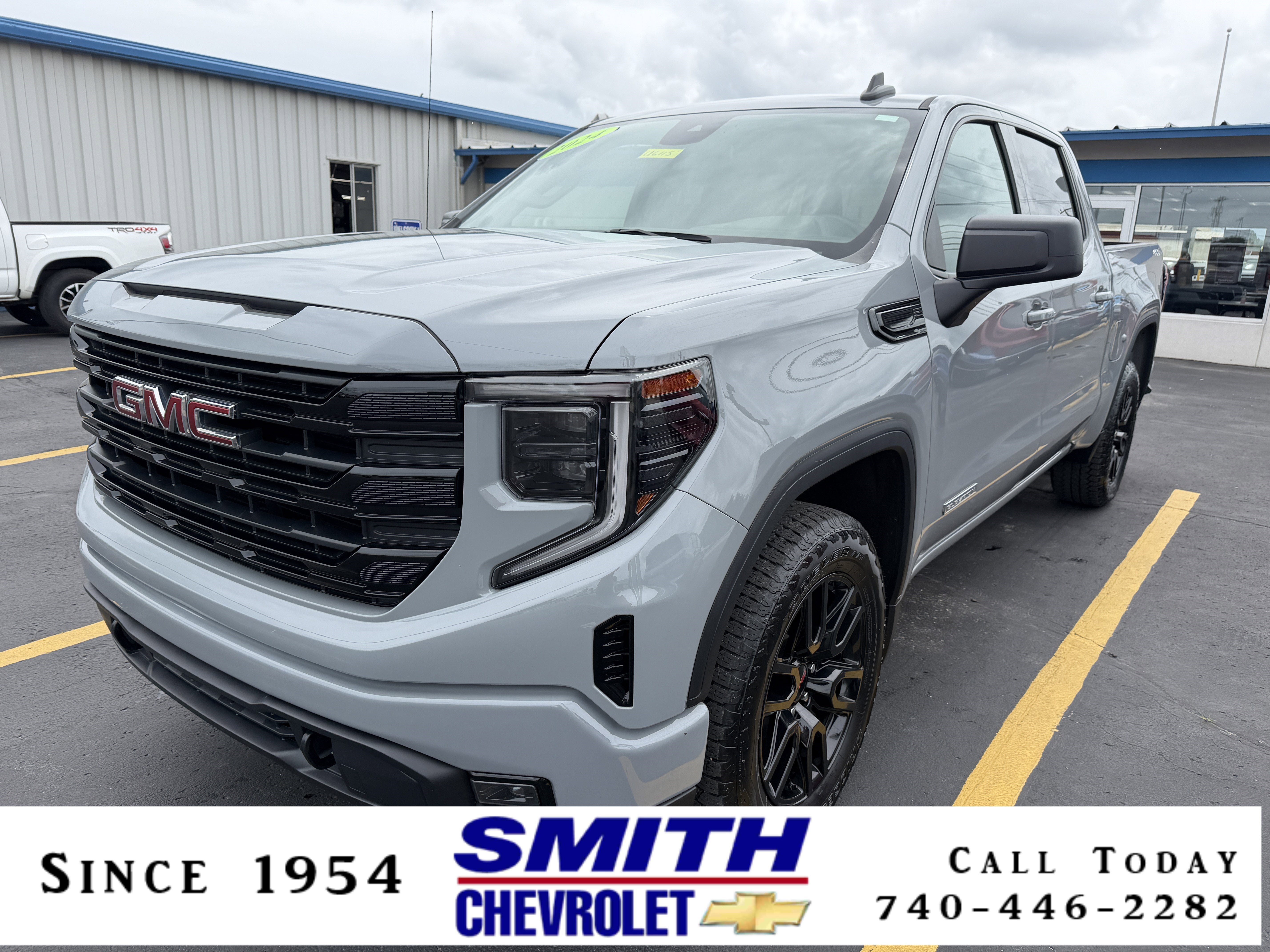 2024 GMC Sierra 1500 Elevation in Thunderstorm Gray — front three-quarter view