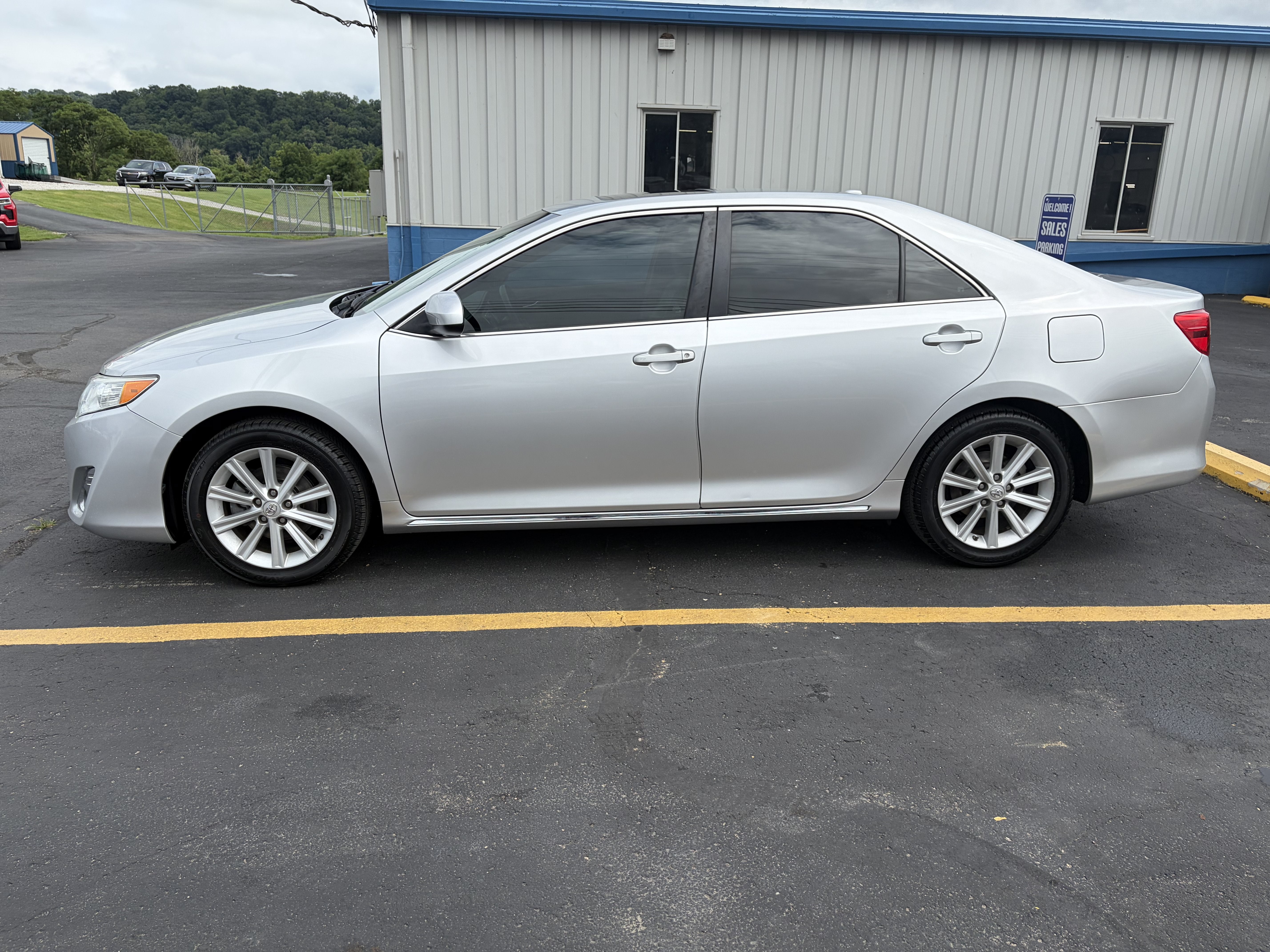 2013 Toyota Camry — side profile view