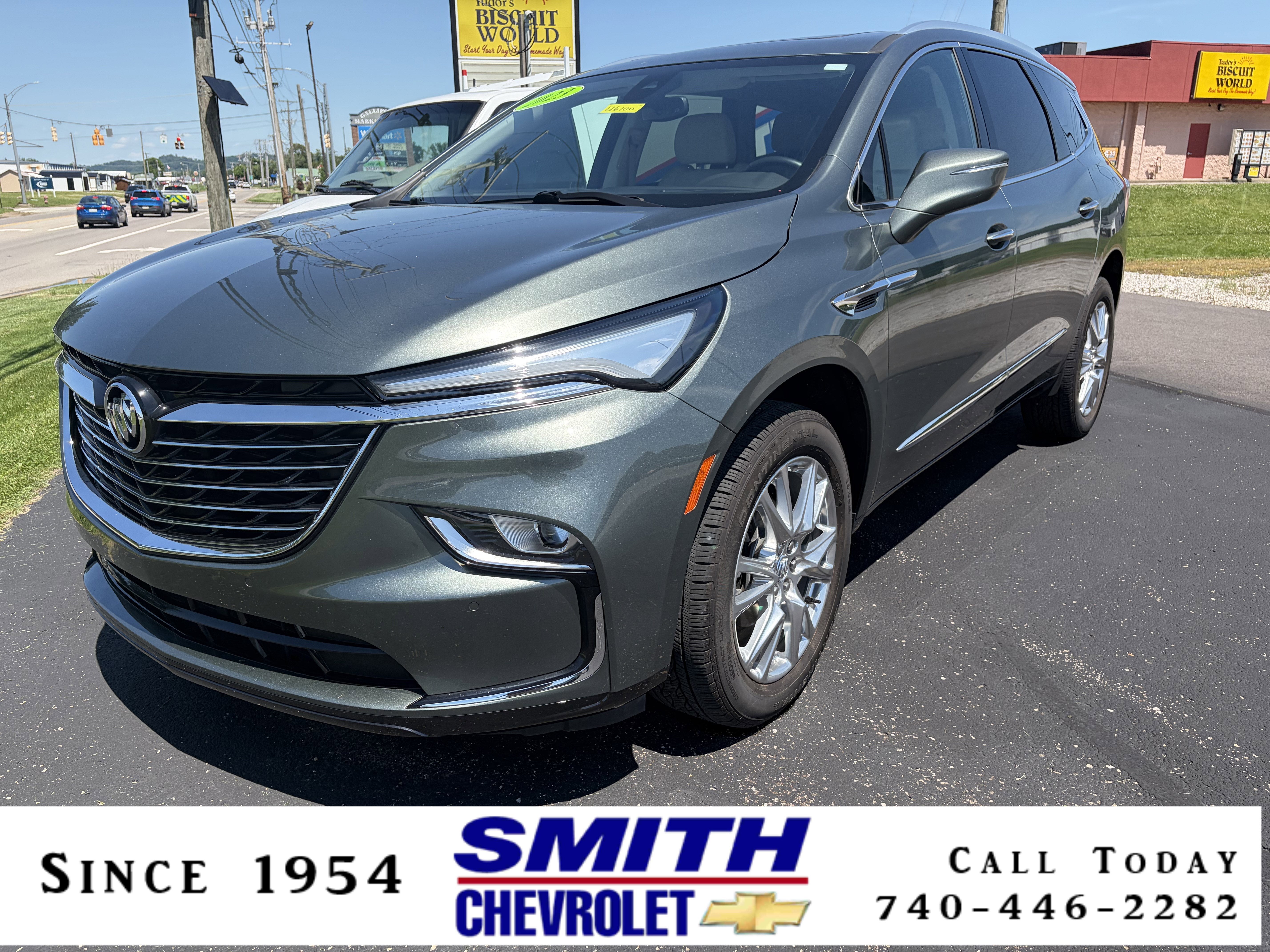 2023 Buick Enclave Essence in Sage Metallic — front three-quarter view