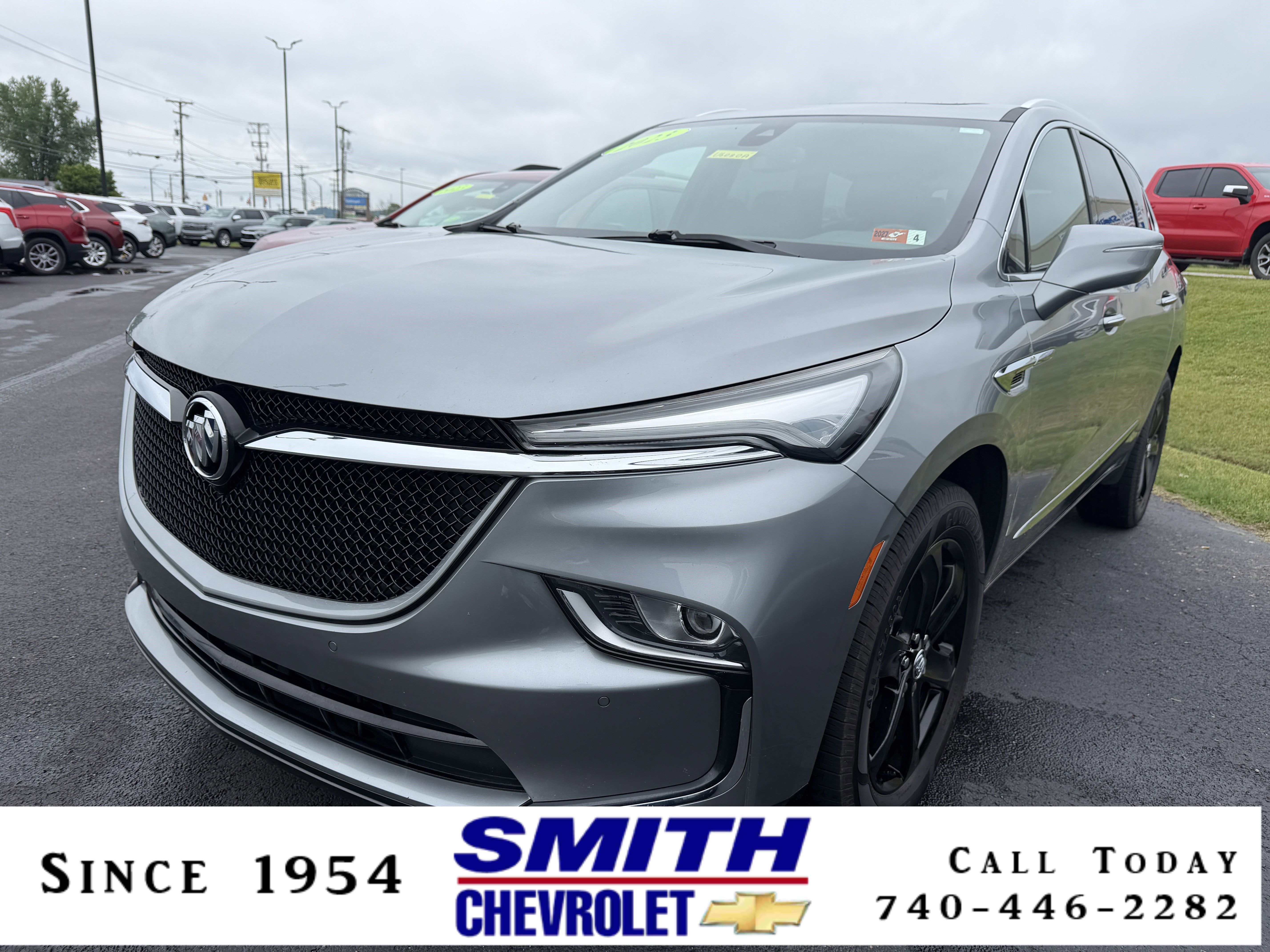 2023 Buick Enclave Essence in Moonstone Gray Metallic — front three-quarter view