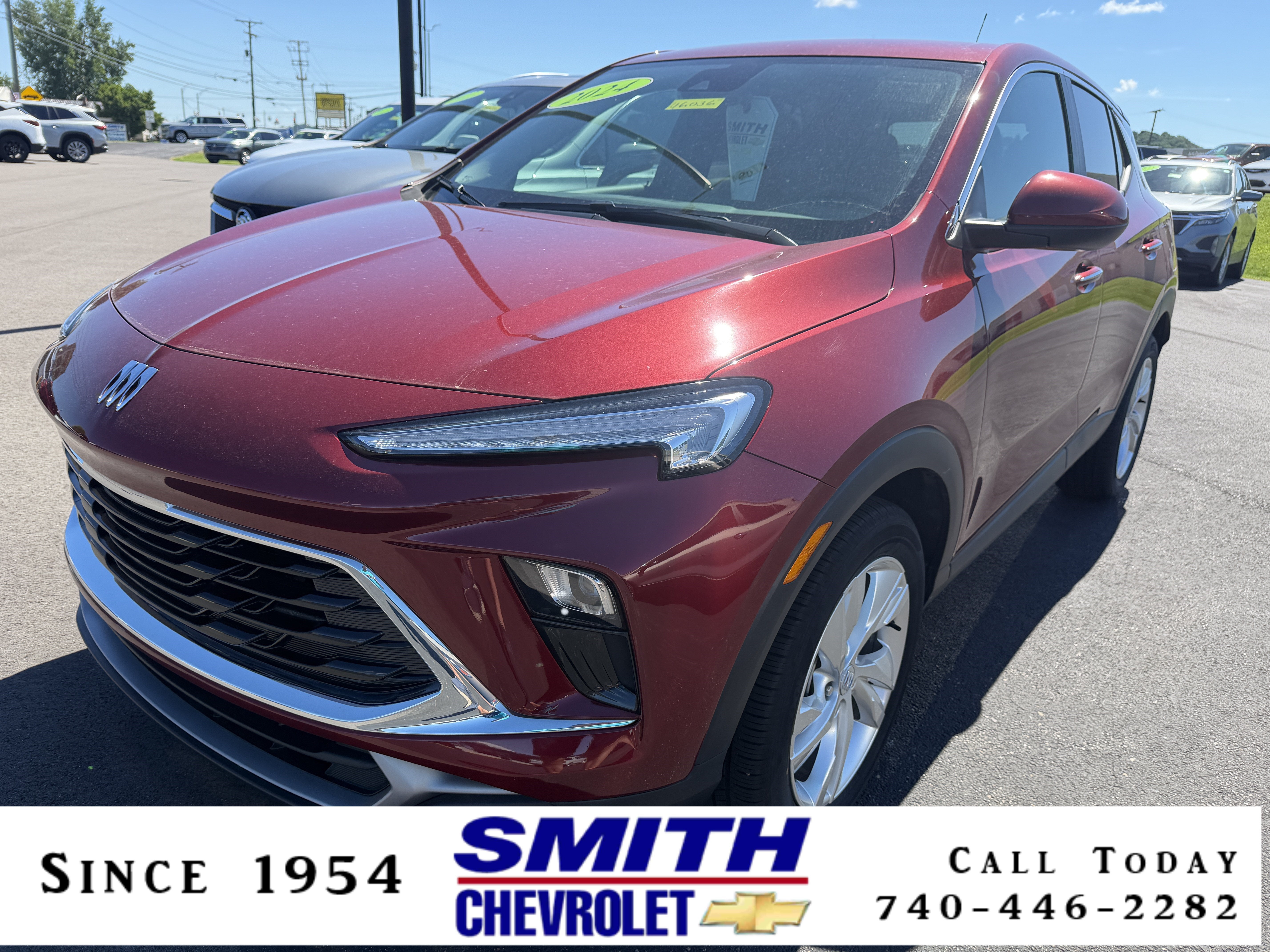 2024 Buick Encore GX Preferred in Cinnabar Metallic — front three-quarter view
