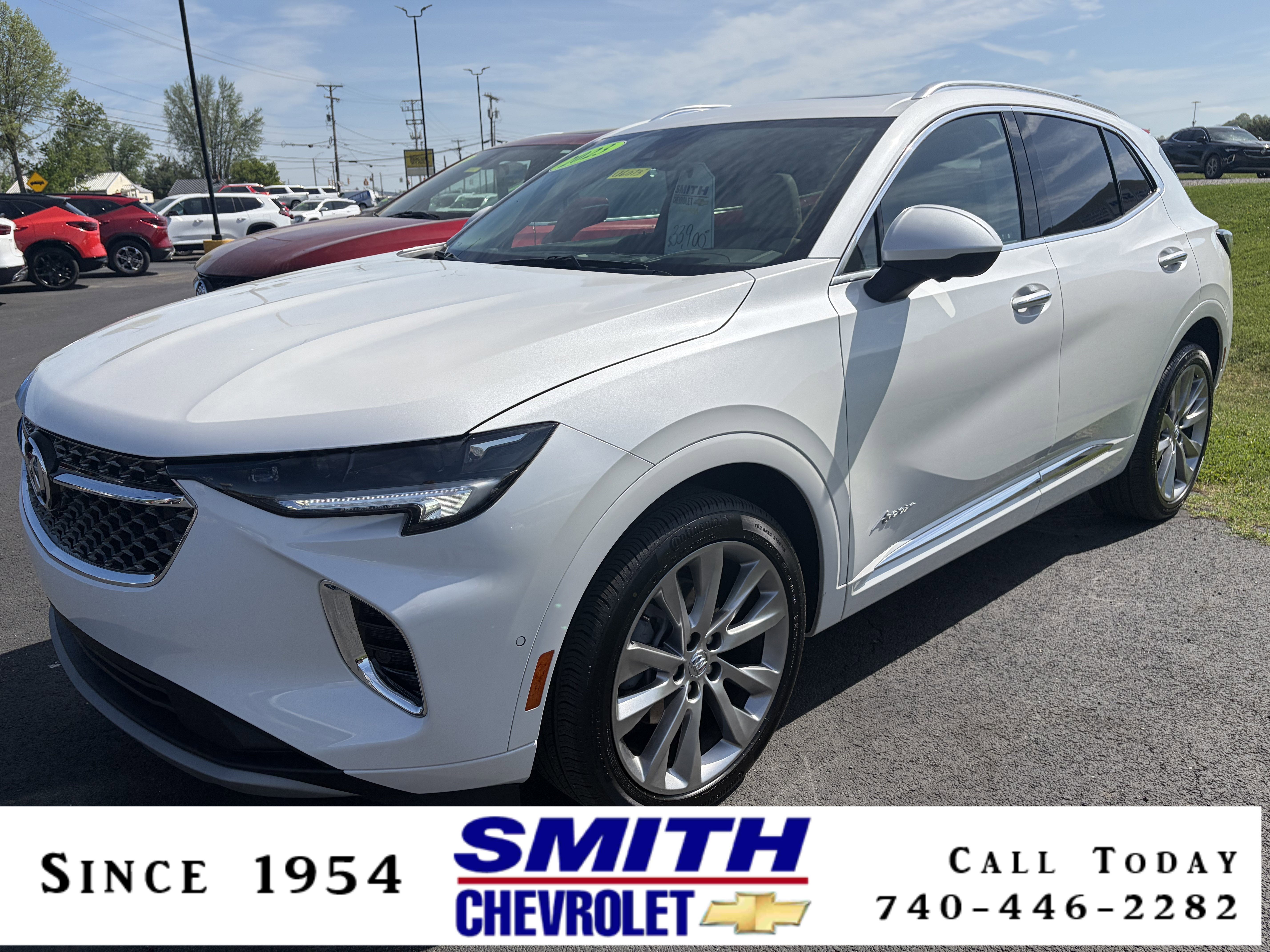 2023 Buick Envision Avenir in White Frost Tricoat — front three-quarter view