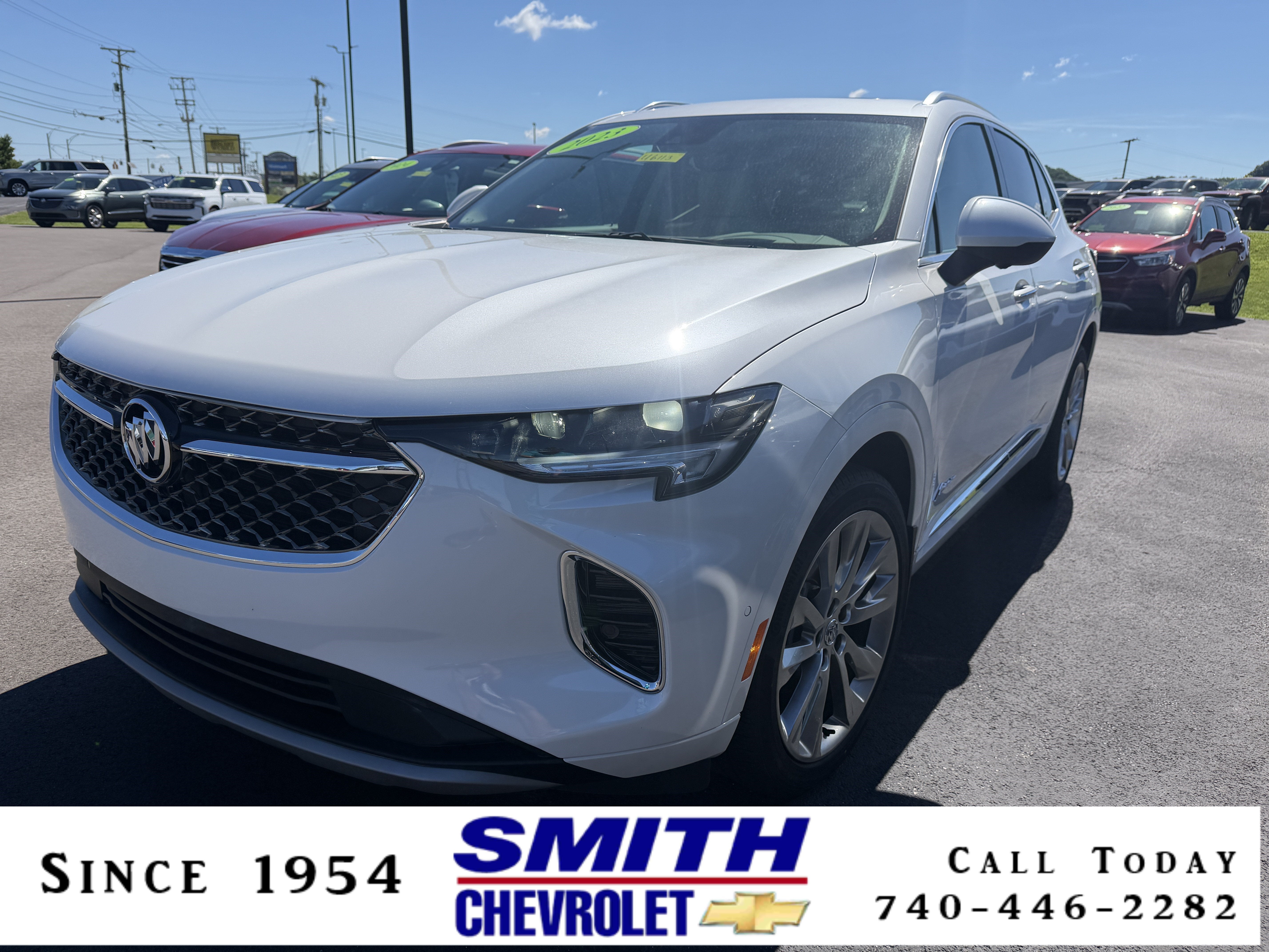 2023 Buick Envision Avenir in White Frost Tricoat — front three-quarter view